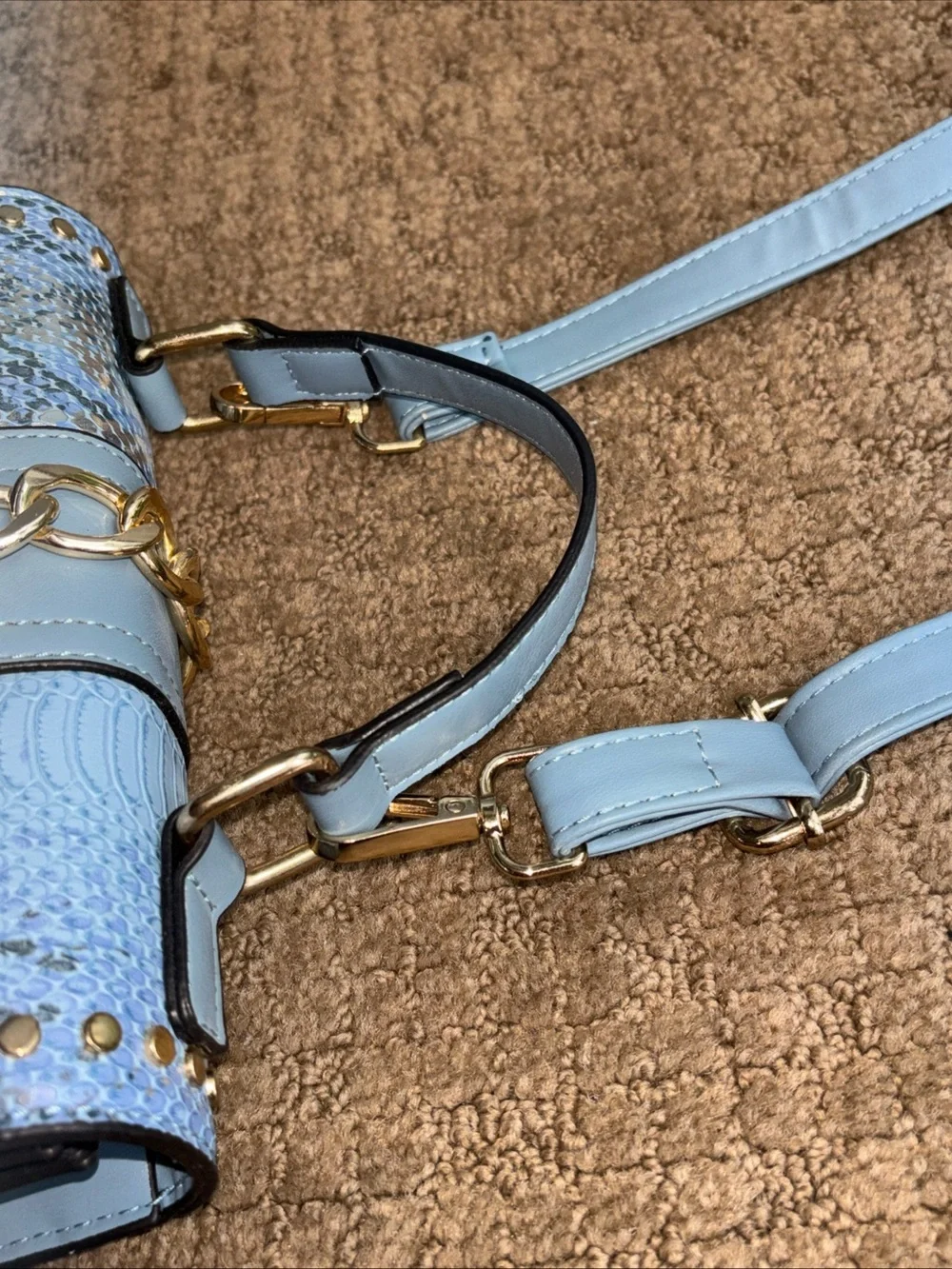 Faux snakeskin crossbody blue purse new with minor mark on bottom